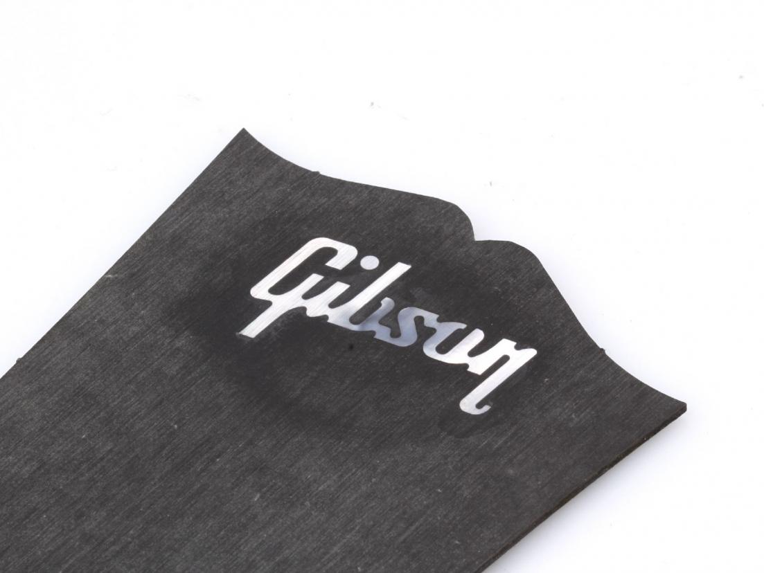 Spots are normal! They came from sanding the Logo!